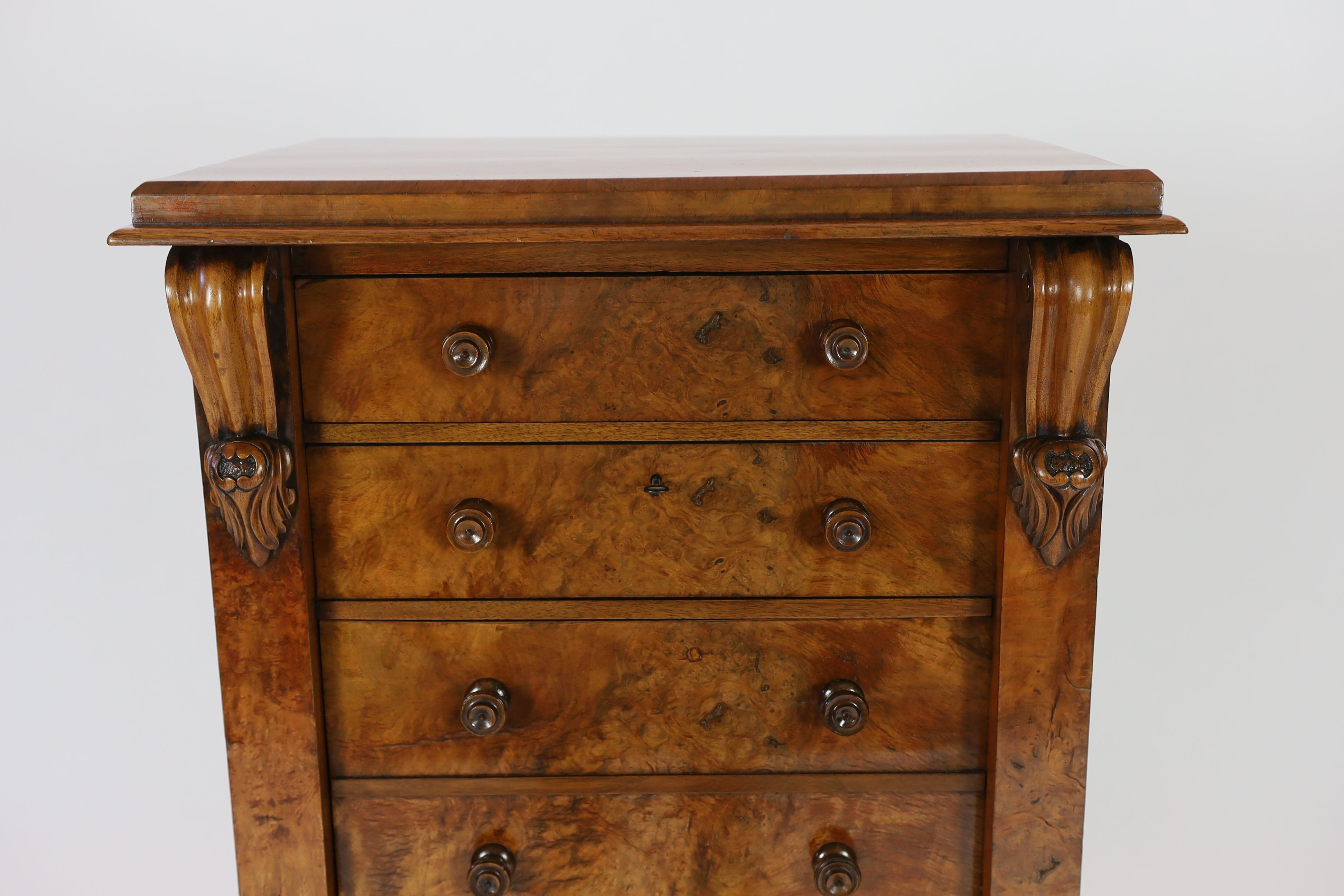 A Victorian figured walnut secretaire Wellington chest, W.59cm D.43cm H.124cm